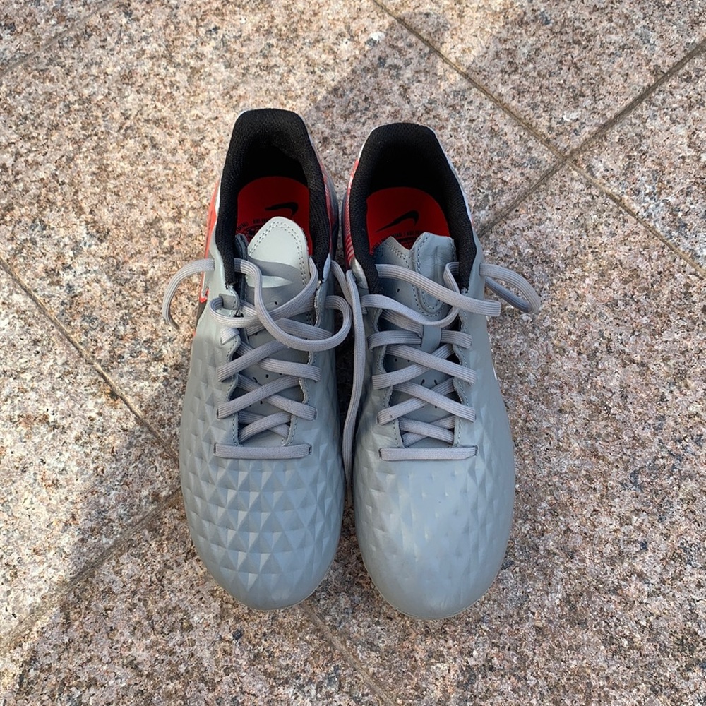 Gray Nike cleats kids